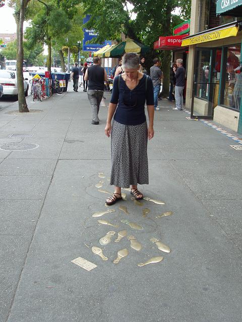 P8310005.JPG - Robin ponders some dance steps on the street in the Capitol Hill area