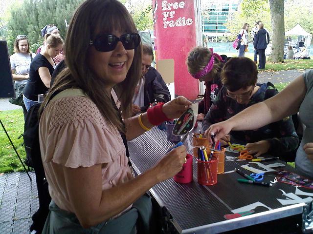 0905091216.jpg - Making shrinky-dinks at the Bumbershoot Festival