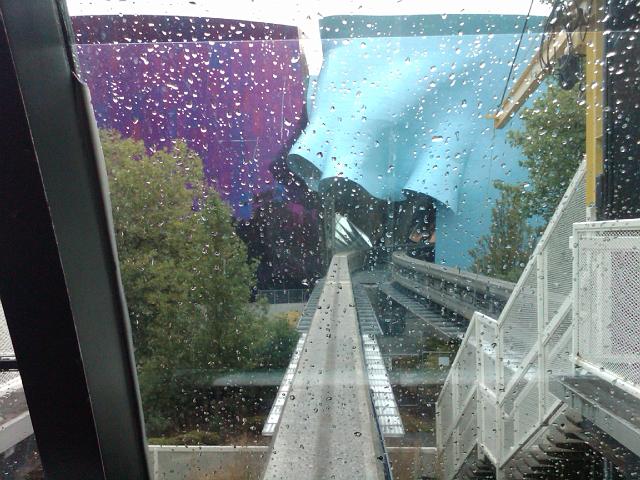 IMG00091-20090901-1455.jpg - The monorail in the rain, approaching the EMP Museum