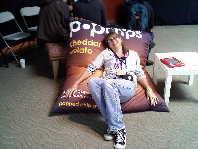 0904001207.jpg - Petra poses on the Pop Chips pillow