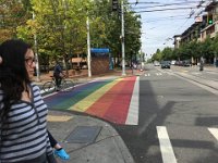 Josephine with the rainbow crosswalk in the background