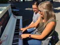 Petra B and Josephine and an outdoor piano